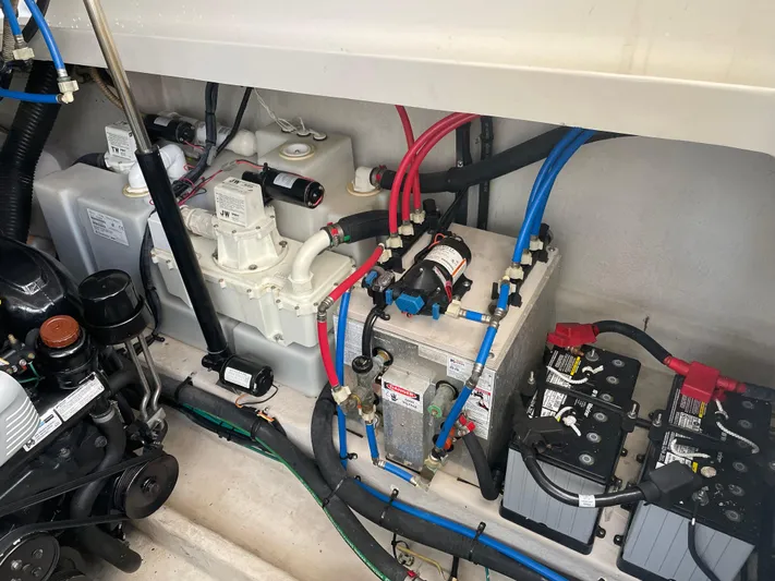  Yacht Photos Pics Engine compartment of a 2014 Sea Ray 370 Sundancer with batteries and wiring.