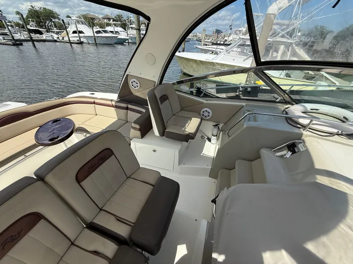  Yacht Photos Pics 2014 Sea Ray 370 Sundancer interior with seating, docked at marina.