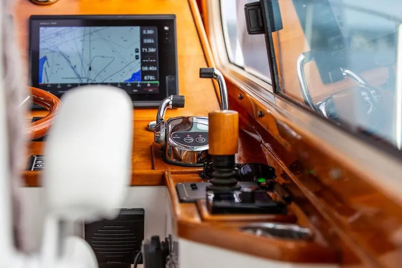 Summer Yacht Photos Pics Hinckley Talaria 44 yacht cockpit with navigation screen and controls, 2002 model.