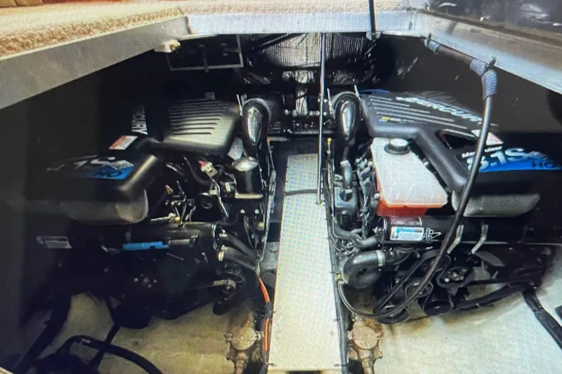 It's Flight O'clock Somewhere Yacht Photos Pics Engine room of 2006 Cruisers Yachts 385 Motoryacht, featuring dual engines.