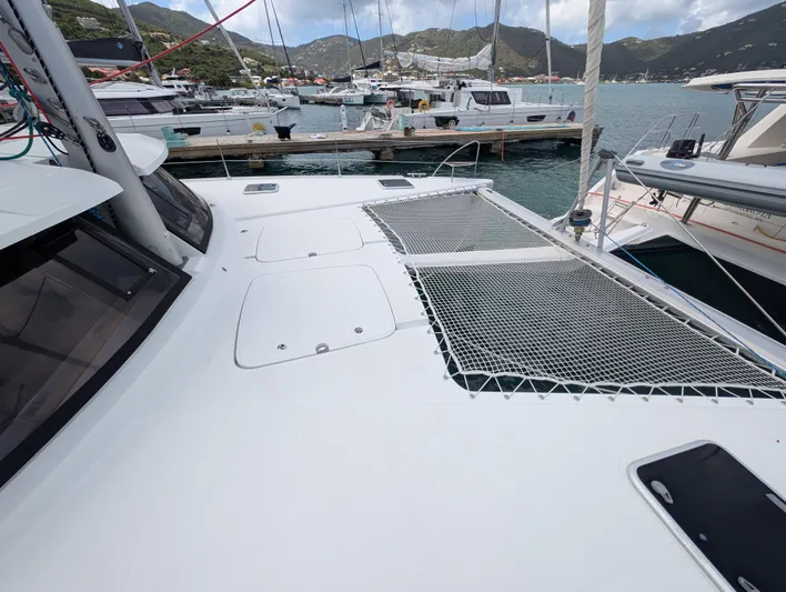 Anila Yacht Photos Pics 2018 Fountaine Pajot Helia 44 Evolution catamaran docked in a marina.