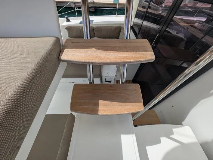 Anila Yacht Photos Pics Staircase on 2018 Fountaine Pajot Helia 44 Evolution catamaran, featuring wooden steps and modern design.