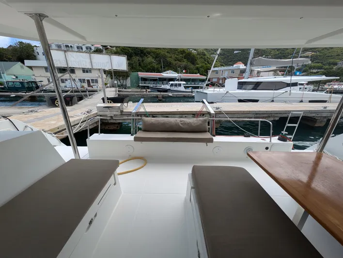 Anila Yacht Photos Pics 2018 Fountaine Pajot Helia 44 Evolution catamaran interior with dock view.