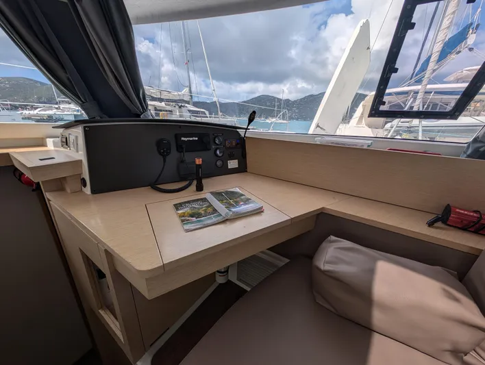 Anila Yacht Photos Pics Interior of 2018 Fountaine Pajot Helia 44 Evolution yacht with navigation station.