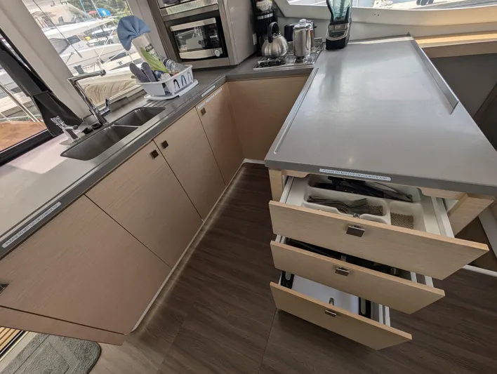 Anila Yacht Photos Pics Modern kitchen interior of 2018 Fountaine Pajot Helia 44 Evolution catamaran.