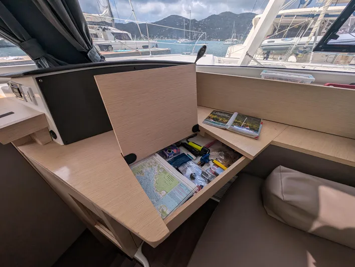 Anila Yacht Photos Pics Navigation station on 2018 Fountaine Pajot Helia 44 Evolution catamaran with maps and tools.