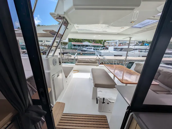Anila Yacht Photos Pics 2018 Fountaine Pajot Helia 44 Evolution catamaran with spacious outdoor seating and dining area.