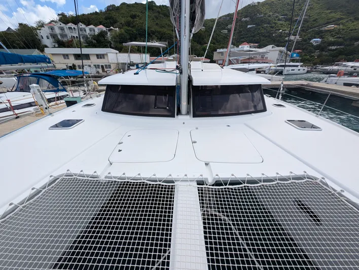 Anila Yacht Photos Pics 2018 Fountaine Pajot Helia 44 Evolution catamaran docked at marina, front view.