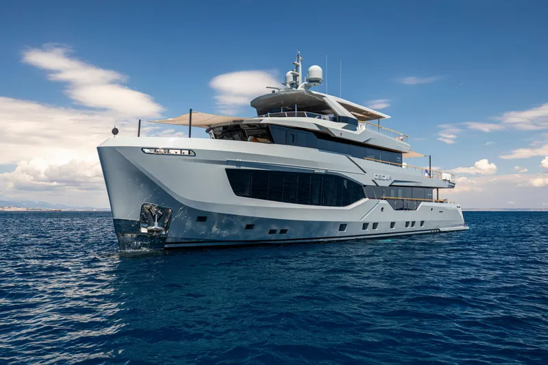 Oscar Yacht Photos Pics Luxury Numarine 37XP yacht cruising on open sea, 2023 model.