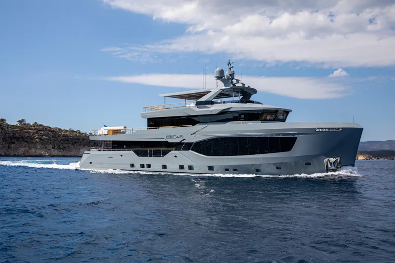 Oscar Yacht Photos Pics 2023 Numarine 37XP yacht cruising on open water under a clear sky.