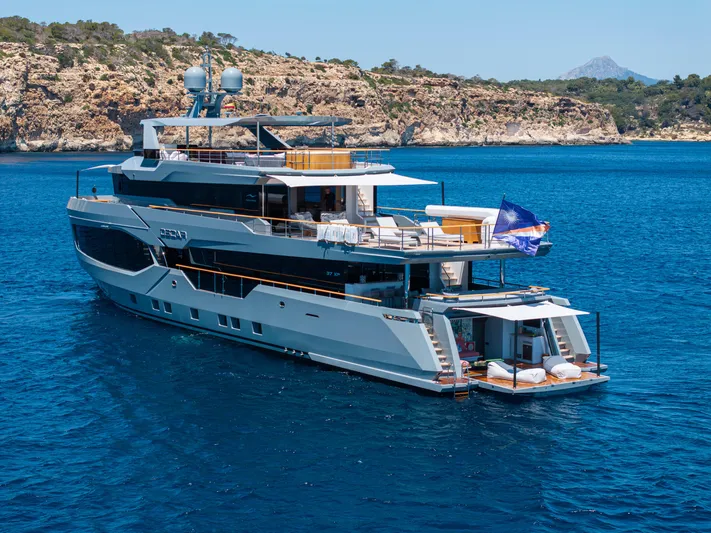 Oscar Yacht Photos Pics Luxury 2023 Numarine 37XP yacht cruising in clear blue waters.