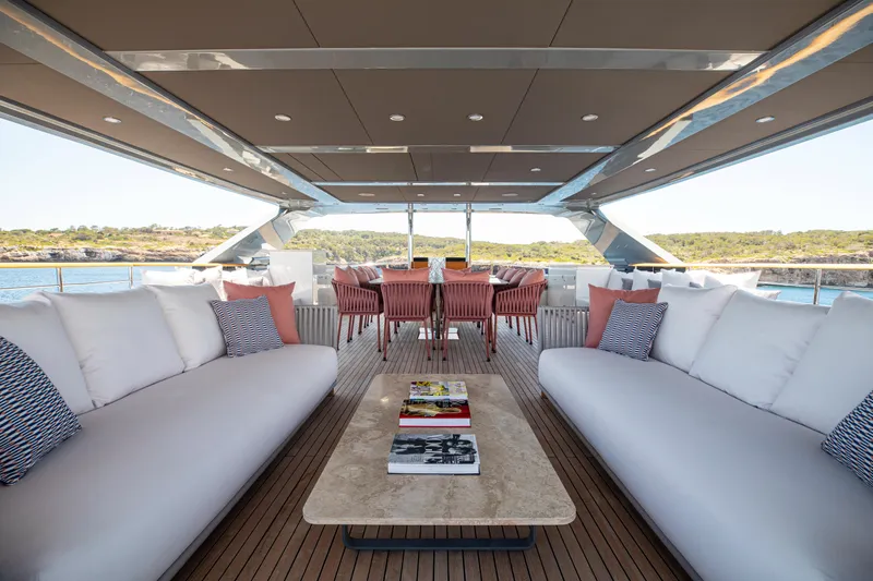 Oscar Yacht Photos Pics Luxurious 2023 Numarine 37XP yacht deck with elegant seating and scenic ocean view.