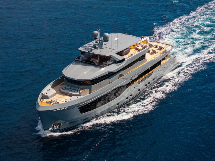 Oscar Yacht Photos Pics Luxurious 2023 Numarine 37XP yacht cruising on open blue sea.