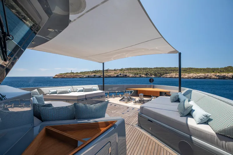 Oscar Yacht Photos Pics Luxurious 2023 Numarine 37XP yacht deck with elegant seating and ocean view.