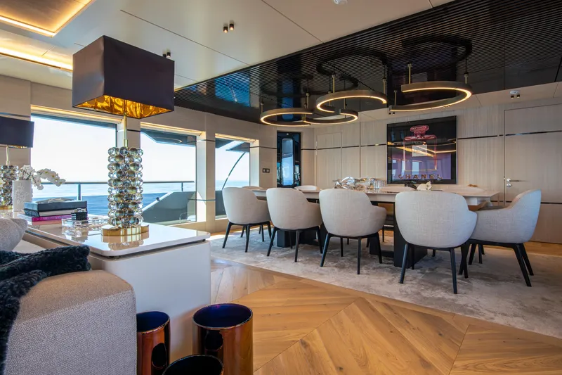 Oscar Yacht Photos Pics Luxurious interior of 2023 Numarine 37XP yacht with elegant dining area and modern decor.