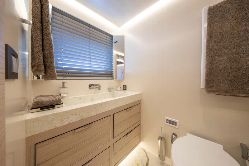 Oscar Yacht Photos Pics Luxurious bathroom in 2023 Numarine 37XP yacht with modern fixtures and elegant design.