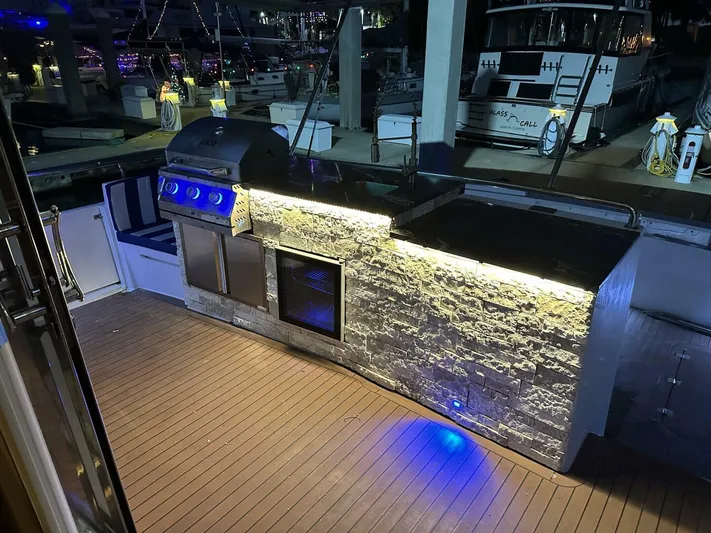  Yacht Photos Pics Outdoor kitchen on 2004 Cheoy Lee 72 yacht with grill and stone countertop.