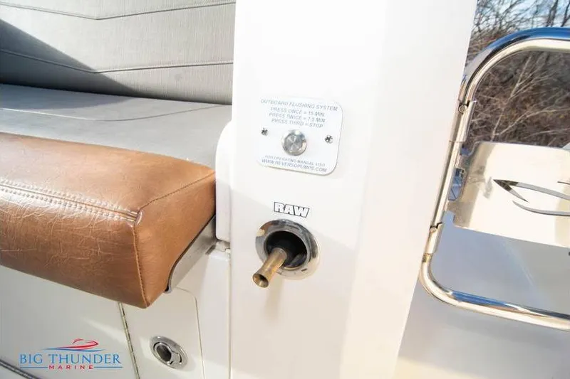  Yacht Photos Pics 2022 Scout 350 LXZ boat interior with leather seating and outboard flushing system.