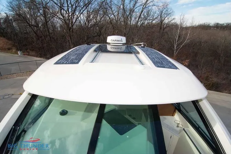  Yacht Photos Pics 2022 Scout 350 LXZ boat with Garmin equipment and solar panels on the roof.