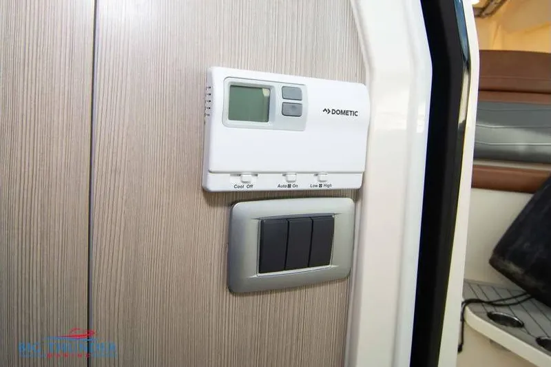  Yacht Photos Pics Dometic control panel on 2022 Scout 350 LXZ boat interior.