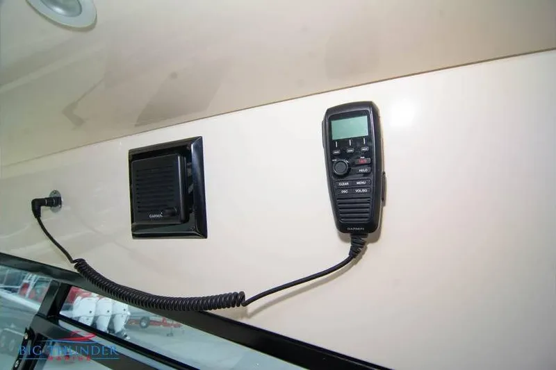  Yacht Photos Pics 2022 Scout 350 LXZ boat interior with Garmin communication device and speaker.
