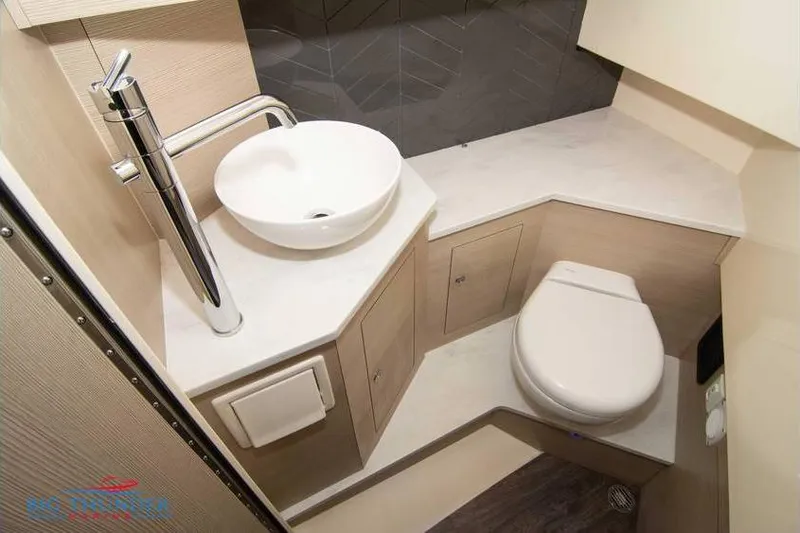  Yacht Photos Pics Modern bathroom in 2022 Scout 350 LXZ boat with sink and toilet.