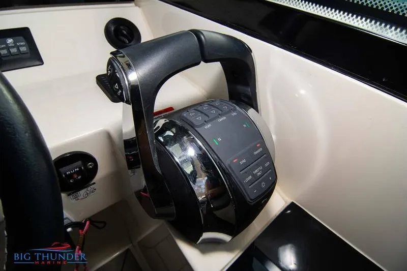 Yacht Photos Pics Throttle control panel of 2022 Scout 350 LXZ boat, featuring modern design and controls.