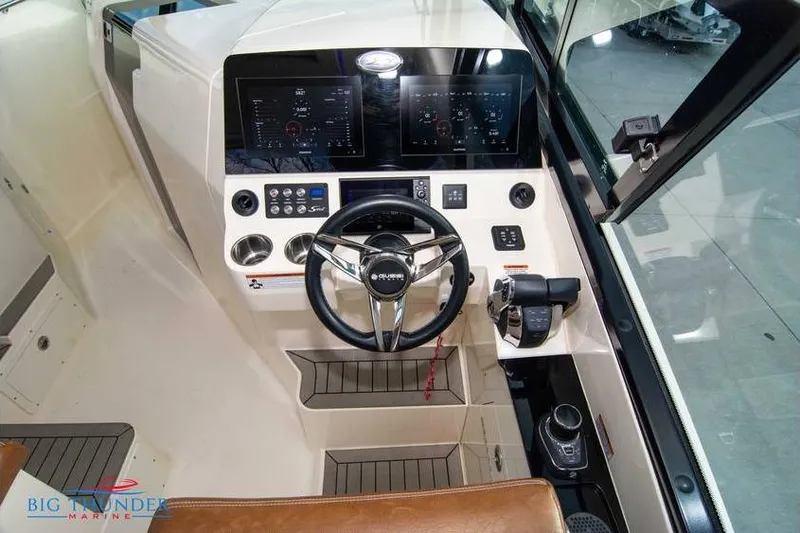  Yacht Photos Pics 2022 Scout 350 LXZ boat helm with modern controls and dual displays.