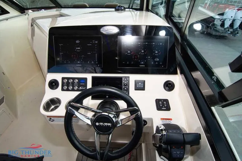  Yacht Photos Pics 2022 Scout 350 LXZ boat helm with dual displays and modern controls.