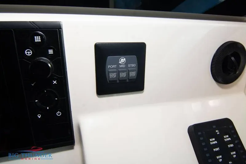  Yacht Photos Pics Control panel of 2022 Scout 350 LXZ boat with start/stop buttons and dials.