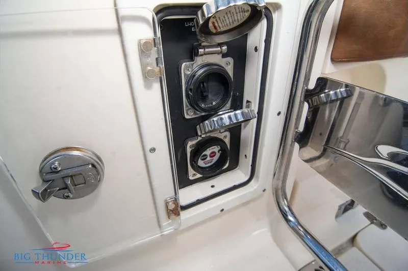  Yacht Photos Pics 2022 Scout 350 LXZ boat electrical panel with open access and controls.