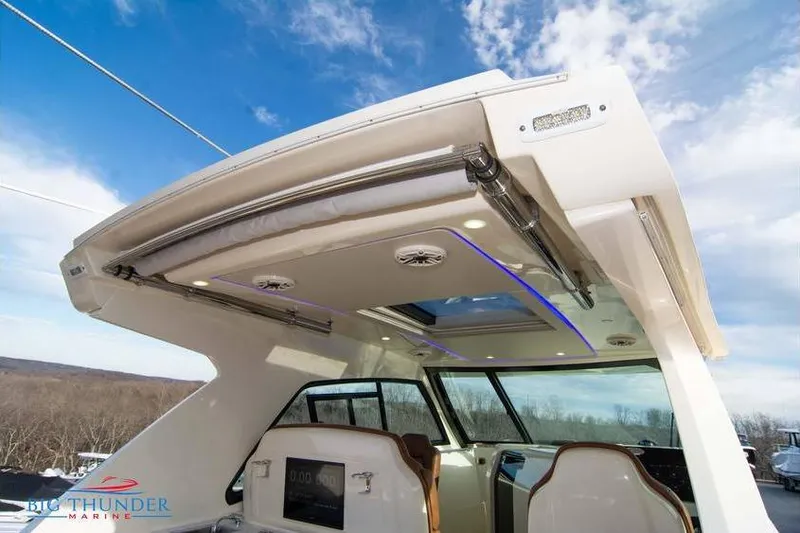  Yacht Photos Pics 2022 Scout 350 LXZ boat interior with modern design and panoramic views.
