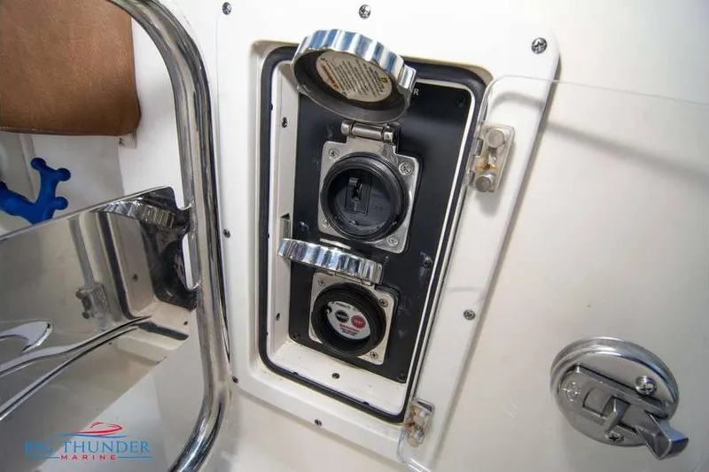  Yacht Photos Pics 2022 Scout 350 LXZ boat electrical panel with open access cover.