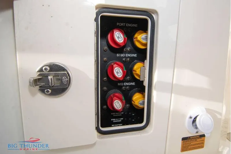  Yacht Photos Pics Control panel of a 2022 Scout 350 LXZ boat with engine switches.
