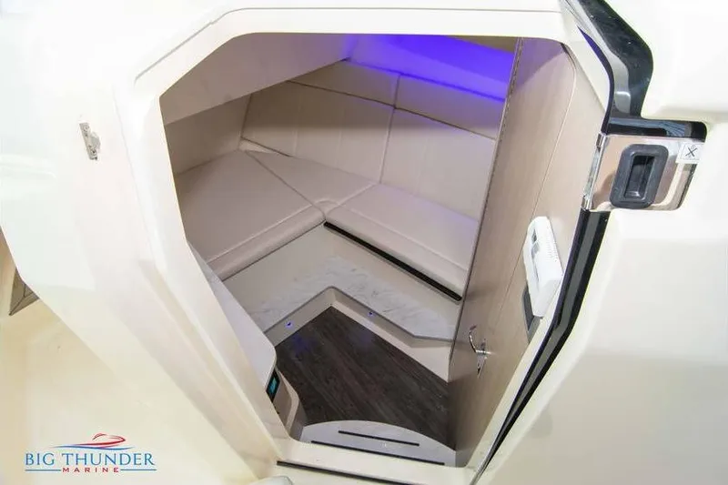  Yacht Photos Pics 2022 Scout 350 LXZ cabin interior with modern seating and ambient lighting.
