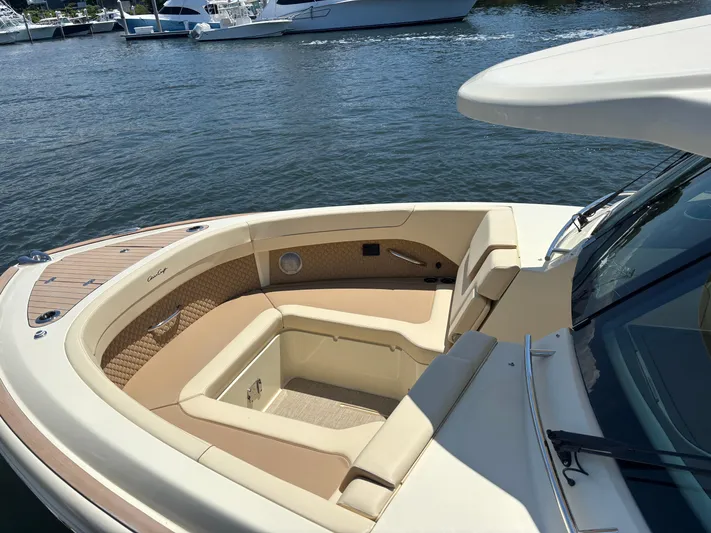  Yacht Photos Pics 2025 Chris-Craft Calypso 32 boat interior with luxurious seating and elegant design.