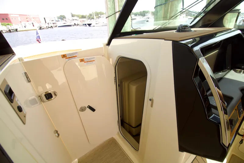  Yacht Photos Pics 2025 Chris-Craft Calypso 32 cabin entrance with sleek interior design.