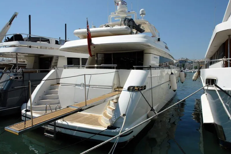  Yacht Photos Pics Sanlorenzo SL88 2006 luxury yacht docked at marina, rear view.