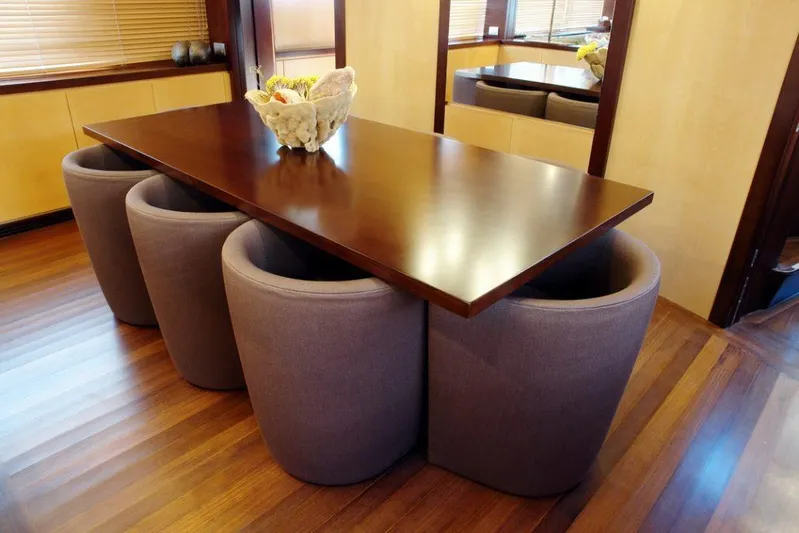  Yacht Photos Pics Luxurious dining area on a 2006 Sanlorenzo SL88 yacht with modern furniture.