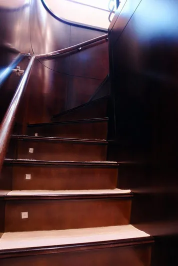  Yacht Photos Pics Elegant wooden staircase on 2006 Sanlorenzo SL88 yacht.