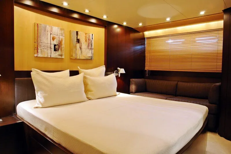  Yacht Photos Pics Luxurious bedroom on 2006 Sanlorenzo SL88 yacht with modern decor and ambient lighting.