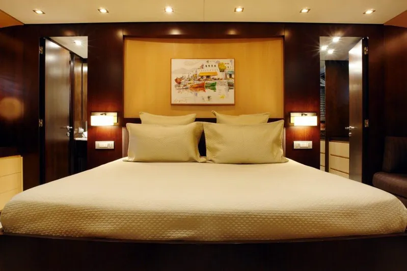  Yacht Photos Pics Luxurious bedroom on a 2006 Sanlorenzo SL88 yacht with modern decor.