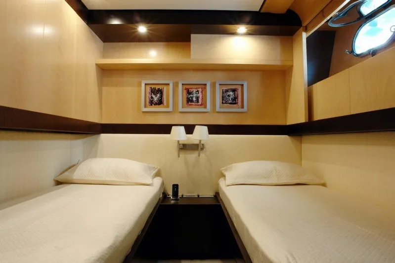  Yacht Photos Pics Twin cabin in 2006 Sanlorenzo SL88 yacht with modern decor and wall art.