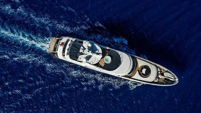  Yacht Photos Pics Aerial view of 2008 Ortona Navi ZIA yacht cruising on deep blue ocean waters.