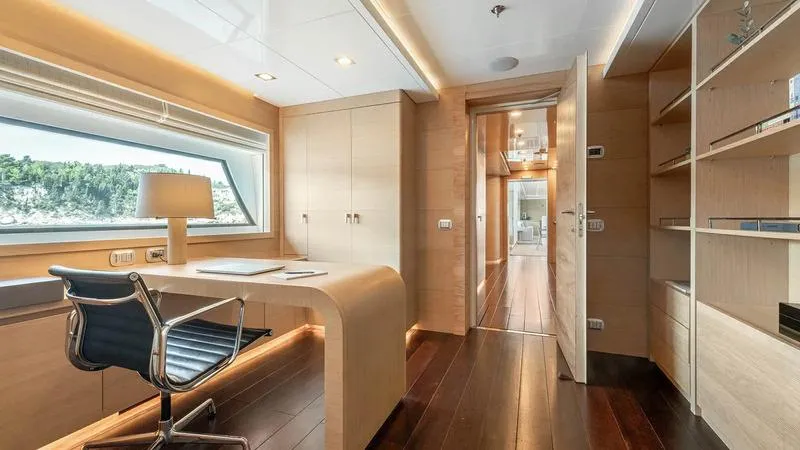  Yacht Photos Pics Luxurious yacht interior with modern desk, chair, and shelving, Ortona Navi ZIA 2008 model.