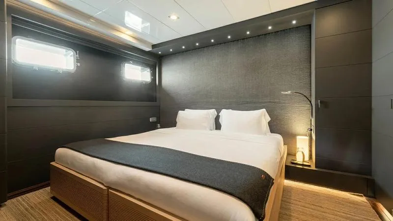  Yacht Photos Pics Luxurious bedroom interior on Ortona Navi ZIA yacht, 2008 model, featuring modern design and ambient lighting.