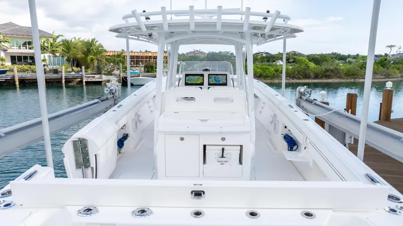  Yacht Photos Pics 2019 Intrepid 400 Center Console boat docked, showcasing spacious deck and modern design.