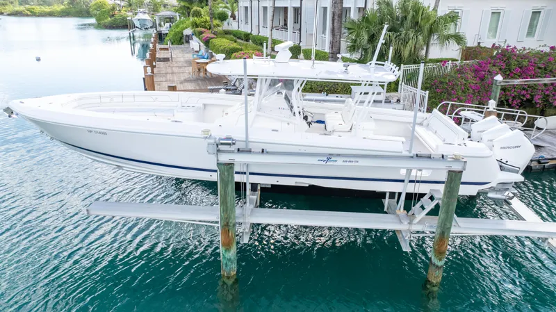  Yacht Photos Pics 2019 Intrepid 400 Center Console boat docked in a scenic waterfront setting.