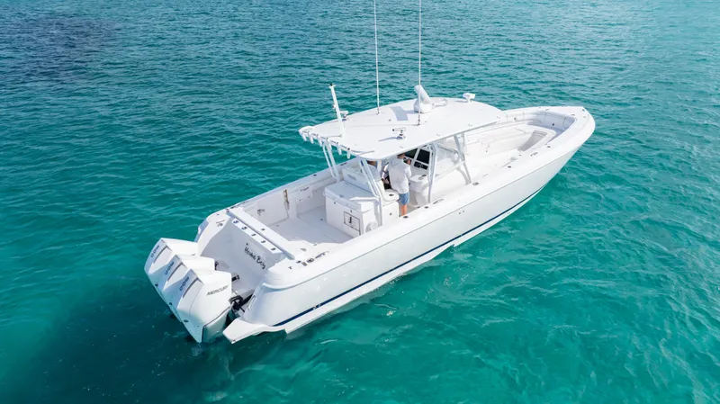  Yacht Photos Pics 2019 Intrepid 400 Center Console boat on clear turquoise water.