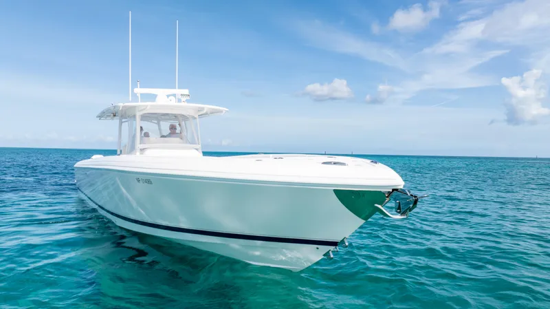  Yacht Photos Pics 2019 Intrepid 400 Center Console boat on clear blue ocean water.